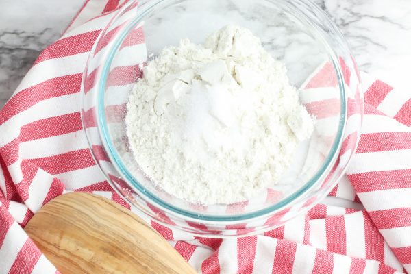 In a medium bowl, whisk together the flour and salt. Set aside.