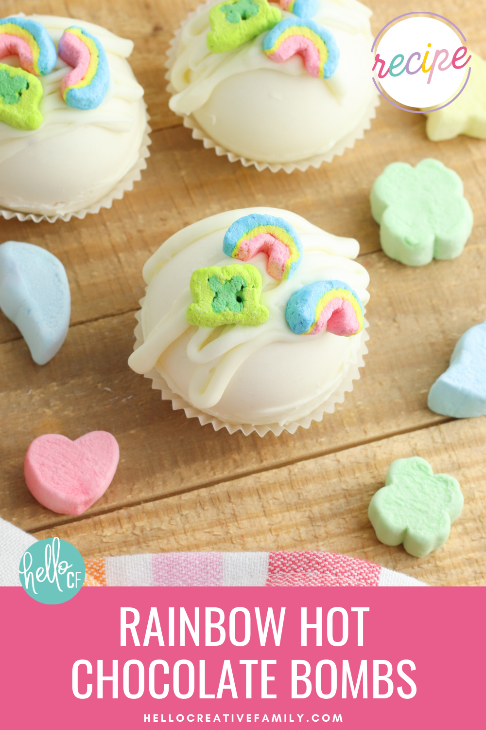 Have you jumped on the Hot Chocolate Bomb trend yet? These sweet treats are so fun and easy to make! Learn how to make rainbow hot chocolate bombs with this step by step tutorial! With Lucky Charms marshmallows they are magically delicious! Perfect for rainbow birthday parties favors or St. Patrick's Day!