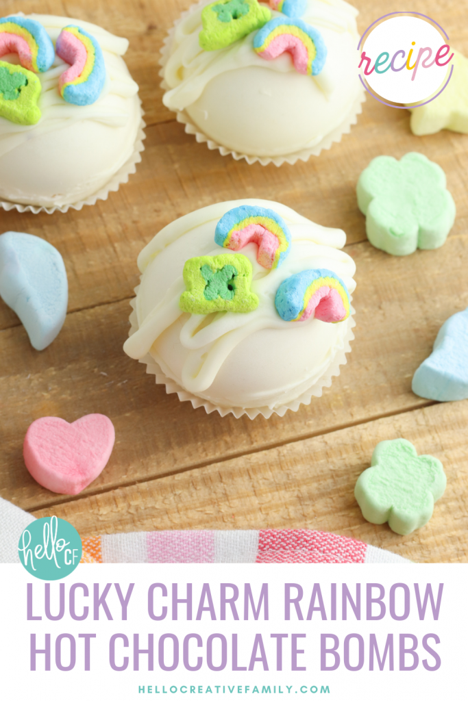 Have you jumped on the Hot Chocolate Bomb trend yet? These sweet treats are so fun and easy to make! Learn how to make rainbow hot chocolate bombs with this step by step tutorial! With Lucky Charms marshmallows they are magically delicious! Perfect for rainbow birthday parties favors or St. Patrick's Day! 