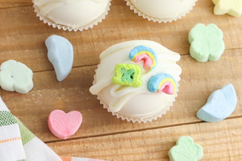 Have you jumped on the Hot Chocolate Bomb trend yet? These sweet treats are so fun and easy to make! Learn how to make rainbow hot chocolate bombs with this step by step tutorial! With Lucky Charms marshmallows they are magically delicious! Perfect for rainbow birthday parties favors or St. Patrick's Day!