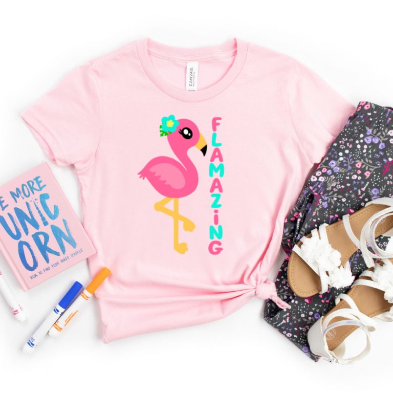 Make the cutest DIY kids shirt ever with this free Flamazing Flamingo Cut File! We're also sharing links to 14 free Flamingo SVGs that you won't want to miss! Perfect for making DIY summer party decorations, shirts, mugs, beach totes and more with your Cricut or other electronic cutting machine!