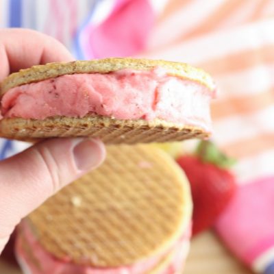 Place remaining cookies on top of the ice cream to form a sandwich. Put the ice cream sandwiches in the freezer and freeze for at least 2 hours before serving to firm up.