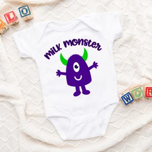 Milk Monster Onesie on a baby blanket with blocks