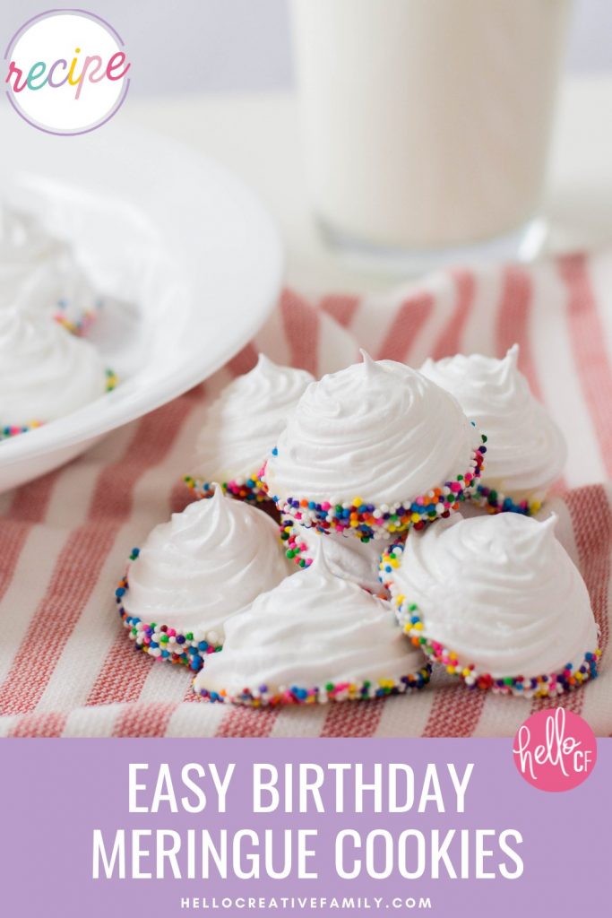 Get ready for a simple and easy birthday dessert idea that packs a ton of pizzaz with this birthday meringue cookies recipe! These beautiful white peaked meringues are dipped in white chocolate and covered in rainbow sprinkles for a fun and festive sweet birthday treat! This recipe uses just 5 ingredients and are just as cute as can be!