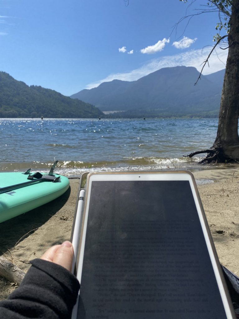 Stand Up Paddle Board and Ipad next to Harrison Bay in BC. 