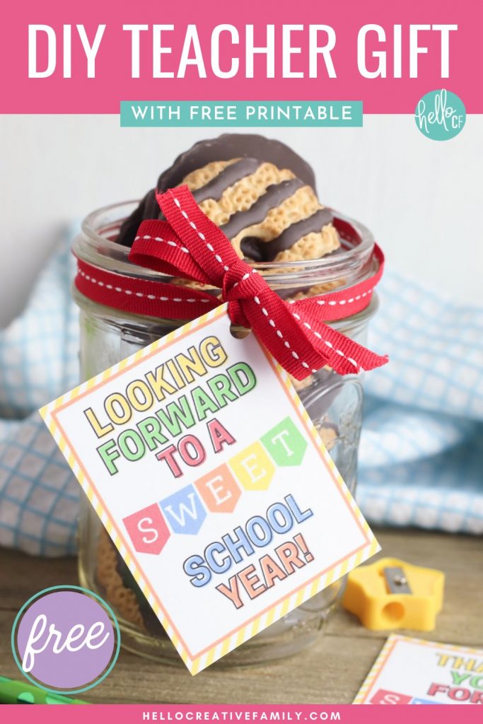 Make a sweet handmade teacher gift to show how much you care with this quick and easy craft! Pack a jar with your teachers favorite treats, and use our free teacher gift tag printable to decorate it with. Gift tag comes in two fun sayings-- 1 that's perfect for a beginning of the school year gift, and the other that's perfect for an end of the school year teacher gift, teacher appreciation, Christmas or anytime your teacher needs a pick me up! Cut by hand or with a Cricut!