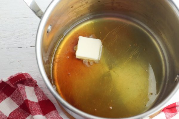 When the cider is reduced, remove from heat. Add the butter and stir until melted.