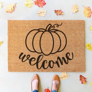 Decorate in fall hygge style with 11 free fall sign cut files including a Welcome Pumpkin SVG that is perfect for making doormats with! Design beautiful DIY autumn home decor using your Cricut or other electronic cutting machine!