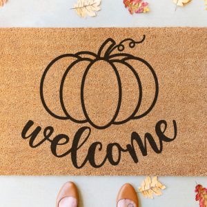Decorate in fall hygge style with 11 free fall sign cut files including a Welcome Pumpkin SVG that is perfect for making doormats with! Design beautiful DIY autumn home decor using your Cricut or other electronic cutting machine!