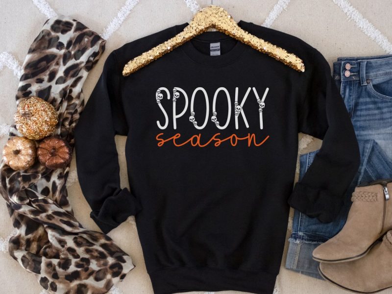 Black spooky season sweatshirt with glitter hanger and pumpkins