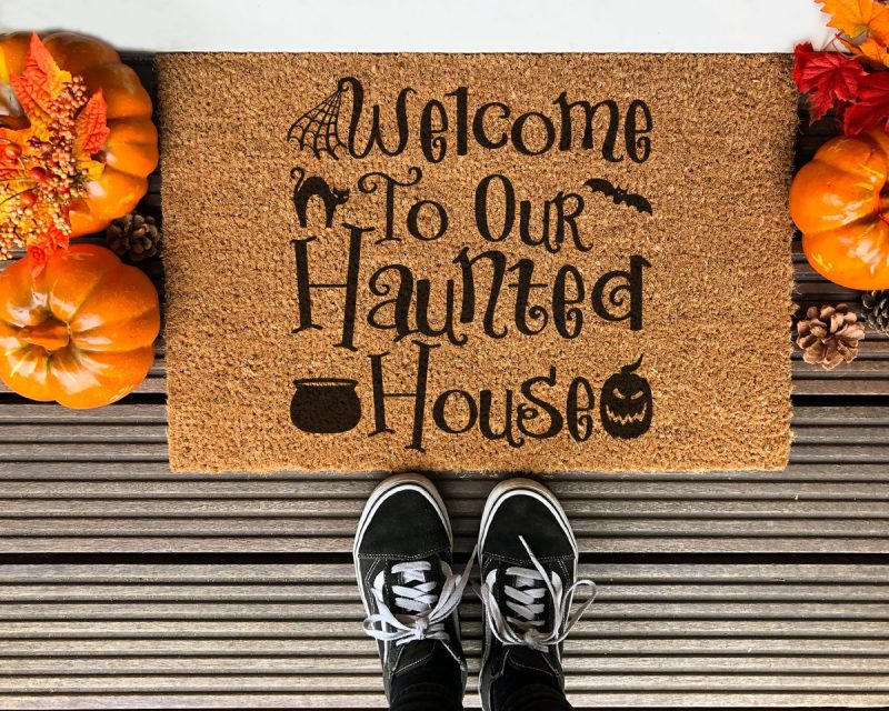 DIY Welcome to our Haunted House Halloween front door mat