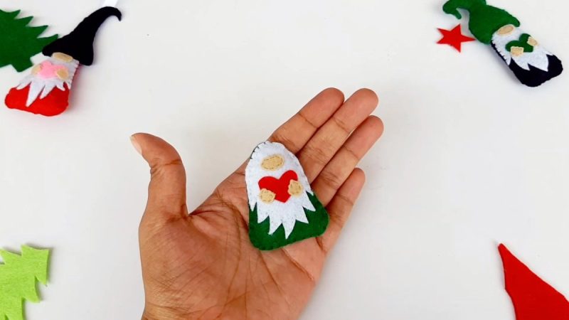 Stuff with Poly-fil. You may want to use a pencil, chopstick or small wooden dowel to make sure the poly-fil fills the gnomes body firmly. Stitch closed and finish with a tight knot.