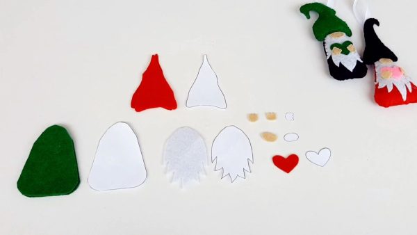Cut out the gnome hat pattern pieces, the gnome beard pattern pieces and the gnome body pattern pieces. Use them as templates to trace and cut out the appropriate color felt pieces as noted.