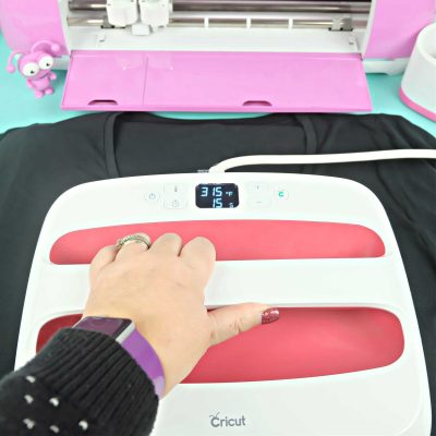 Follow the instructions for applying the type of HTV you’re using to the material that you are applying it to. I like using the Cricut EasyPress Temperature Guide for this.