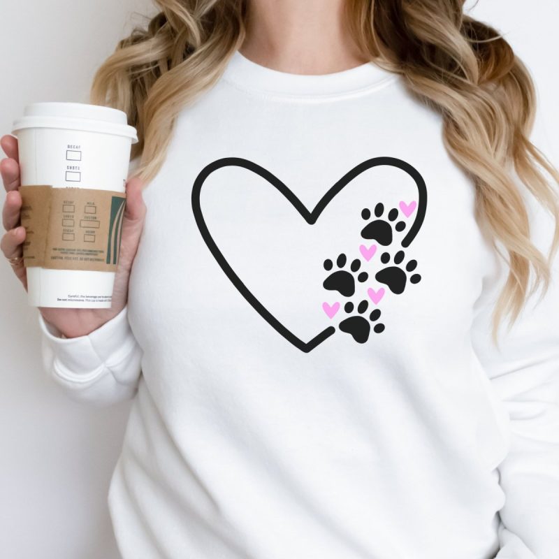 Heart Paw Print SVG cut out of heat transfer vinyl and applied to a sweatshirt. 