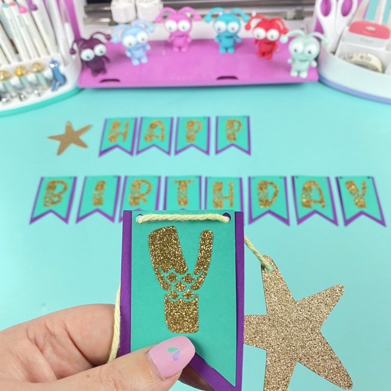 Step 6: String your banner on ribbon or yarn. Hang and enjoy!