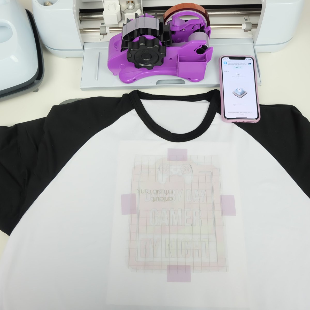 Cricut Infusible Ink Shirt with a Cricut Infusible Ink Design taped to it. 