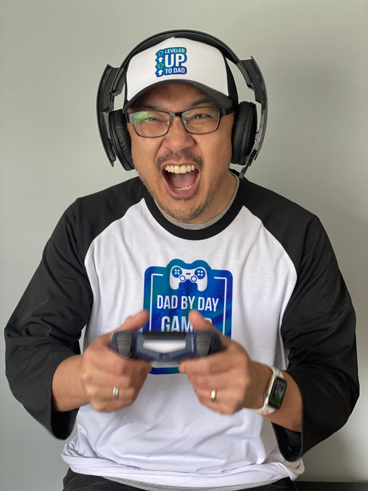 Know a dad who loves video games? We're sharing 3 DIY Father's Day Cricut Ideas that gamer dads will love! We're sharing how to make a Leveled Up To Dad hat, a Dad By Day, Gamer By Night shirt and a set of stackable mugs with video game remotes, each family member's name and a player number that relates to their birth order! Pull out your Cricut Maker, Cricut Explore or Cricut Joy and Infusible Ink and let's get crafting!