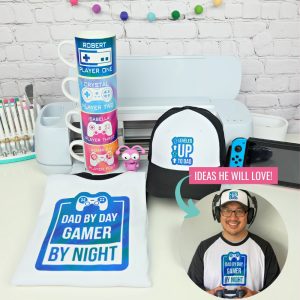Know a dad who loves video games? We're sharing 3 DIY Father's Day Cricut Ideas that gamer dads will love! We're sharing how to make a Leveled Up To Dad hat, a Dad By Day, Gamer By Night shirt and a set of stackable mugs with video game remotes, each family member's name and a player number that relates to their birth order! Pull out your Cricut Maker, Cricut Explore or Cricut Joy and Infusible Ink and let's get crafting!