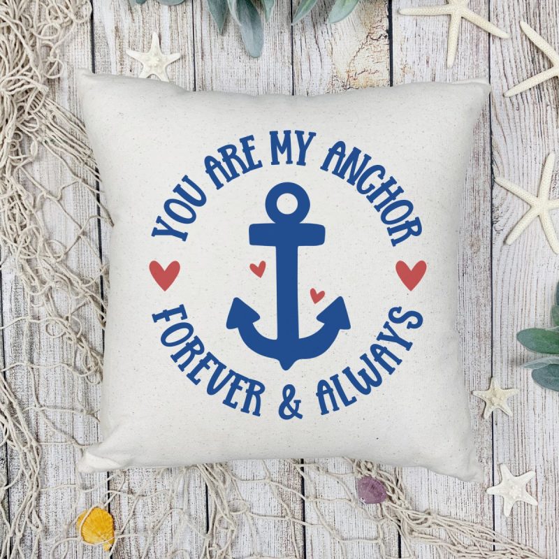 You Are My Anchor Always and Forever image on a pillow surrounded by shells and beach items