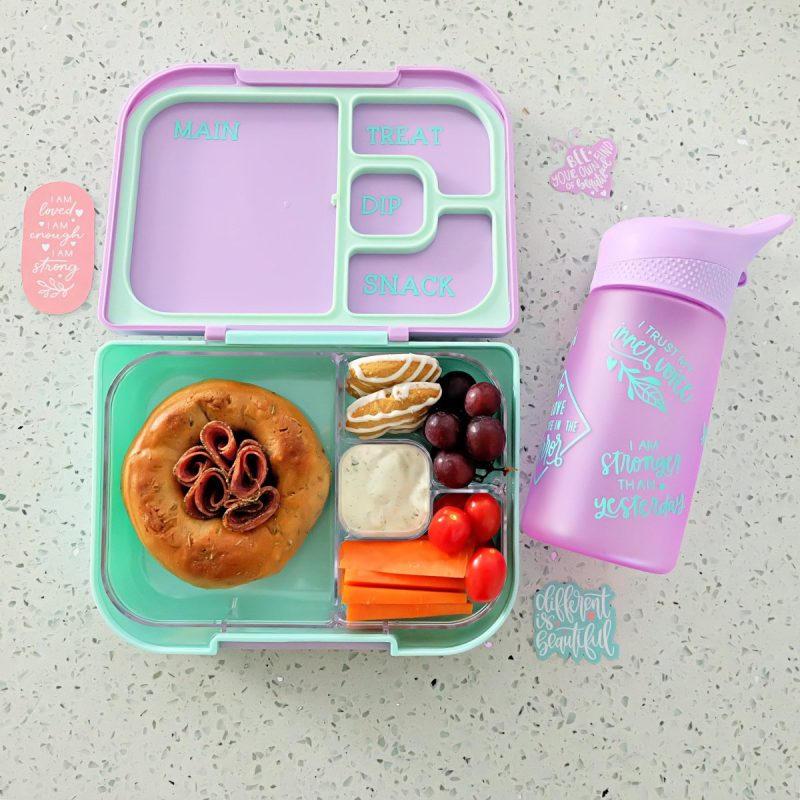 Making customized back to school gear is easy with Cricut! We are filling classrooms full of positive energy with these DIY positive affirmation water bottle, bento box and lunch box notes! Grab the Cricut cut file canvas along with step by step instructions to make your own!