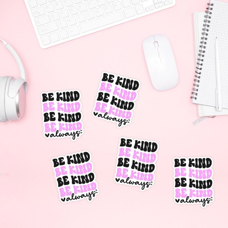 Be Kind Always Retro Design stickers on a pink desktop