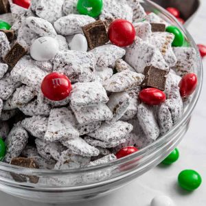 Your favorite Chex Mix got a Christmas makeover--this Christmas Puppy Chow has the peppermint chocolate combo that the holidays are made of! Add some festive red and green M&M's to really get festive! 