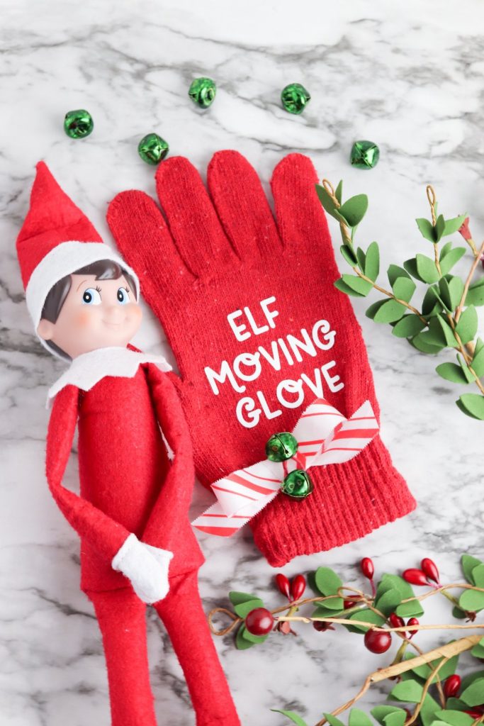 Use your Cricut Maker, Cricut Explore or Cricut Joy to make DIY Magic Elf Moving Gloves for your Elf On The Shelf. Don't let your elf's magic disappear when moving them by wearing these special magic gloves! Make this Cricut Christmas Craft using dollar store gloves and Cricut Iron-On. Includes a free SVG file!