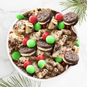 A holiday favorite, brought to life in this indulgent snack mix, Rice Chex&trade; cereal is coated in vanilla almond bark and crushed cookies, then tossed with additional cookies and chocolate candies.