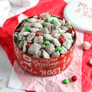 This Puppy Chow is just 3 ingredients and takes just under five minutes to whip up, no baking necessary! It&rsquo;s a delicious Chex mix recipe that is a holiday tradition in our home. 