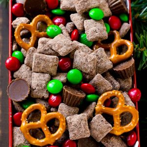 No holiday party is complete without a big bowl of reindeer chow! This Christmas chex mix is loaded with chocolate flavor and is perfect for feeding a crowd. 