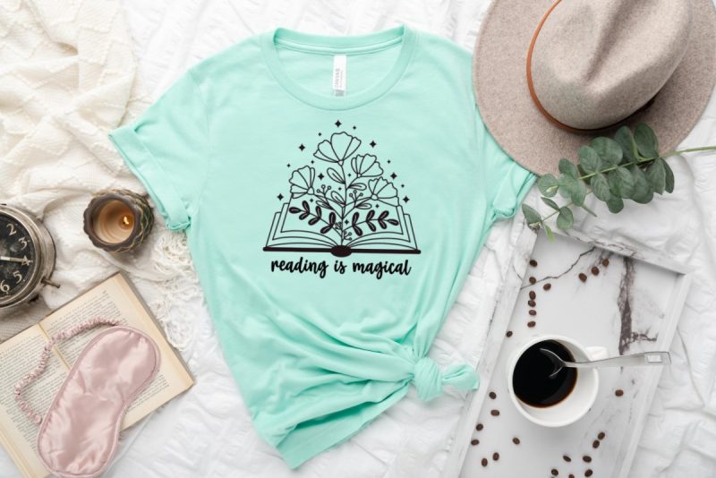 Mint green shirt with Reading Is Magical design on front