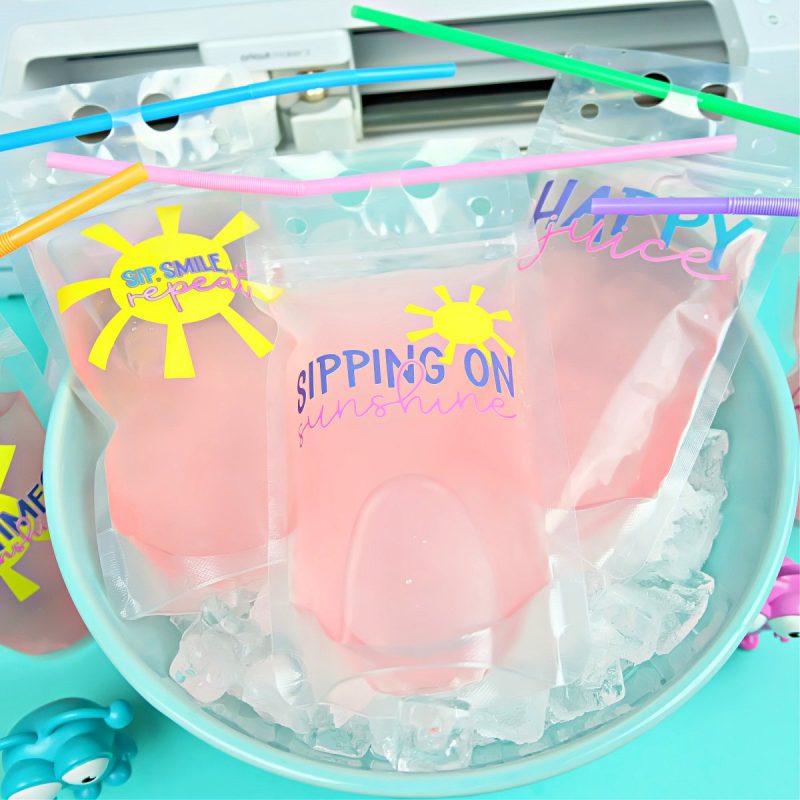 Celebrate summer with a cool beverage! Learn how to make DIY Color Changing Drink Pouches using Cricut color changing vinyl! These drink pouches are reusable and decorated with the cutest summer SVG files! A fun and easy Cricut summer craft project that you can make with your Cricut Maker, Cricut Explore Air or Cricut Joy!