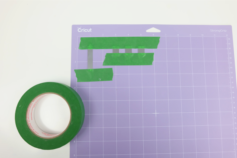 Make sure your white star wheels are pushed to the right. Load your Cricut Maker with your engraving tip. Use the arrow button on your machine to load your mat, then press the flashing Cricut C. When your Cricut is done engraving, press the arrow button again to unload your mat.