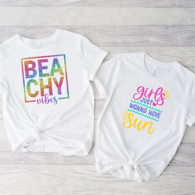 Get ready for summers at the lake or ocean by downloading these free beach SVGs for summer Cricut crafting fun! These designs are too stinking cute and perfect for making DIY t-shirts, tank tops, beach bags, wine tumblers and more for summer! Includes a Beachy Vibes SVG and a Girls Just Wanna Have Sun design for all of the 80's music lovers along with 24 free beach cut files!