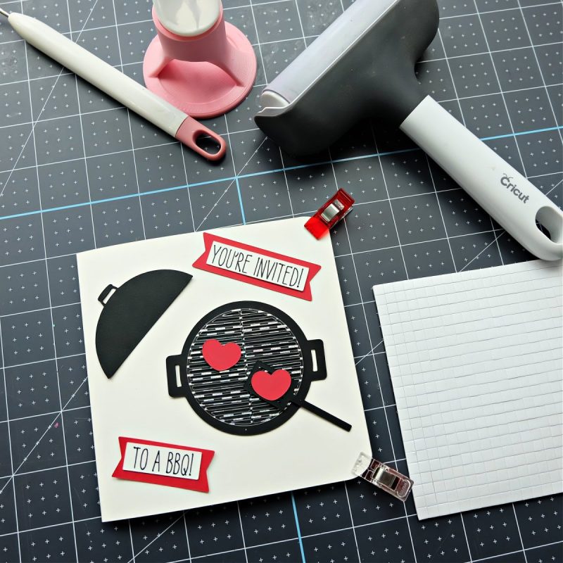 Cricut BBQ invitation laying on a work surface having just been assembled