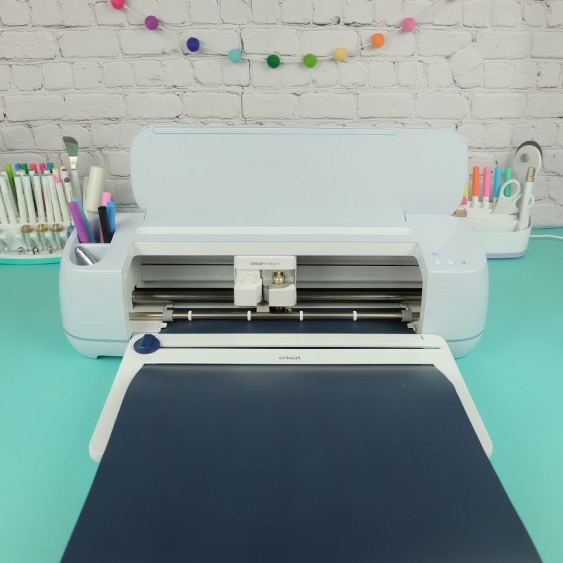 Cricut Maker 3 loaded with black iron-on