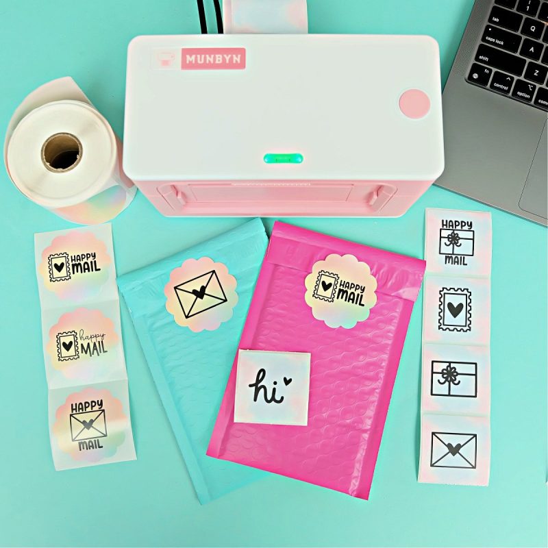 Munbyn Printer with Happy Mail Sticker Set, Pink and Turquoise mailers and Apple Laptop. 