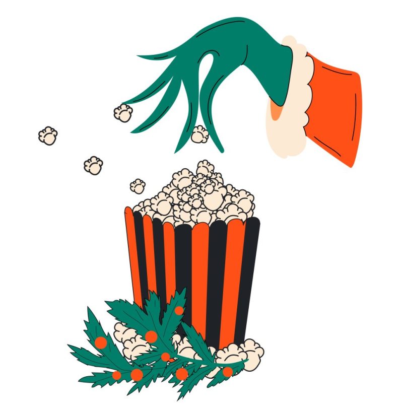 Grinch hand picking up popcorn.