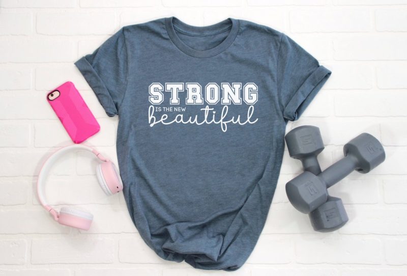 Working out is about so much more than the number on the scale! Download our Strong Is The New Beautiful SVG along with 10 Free Gym SVG Files that you can use to make gym gear using your Cricut cutting machine! 