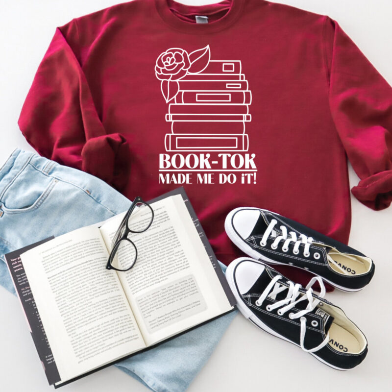 Book Tok Made Me Do It Sweatshirt made with design from Hello Creative Familly