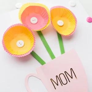 Grab some cupcake liners, print the free coffee cup template, and create a stunning handmade Mother’s Day card. It's so easy and simple, even if you're not crafty.