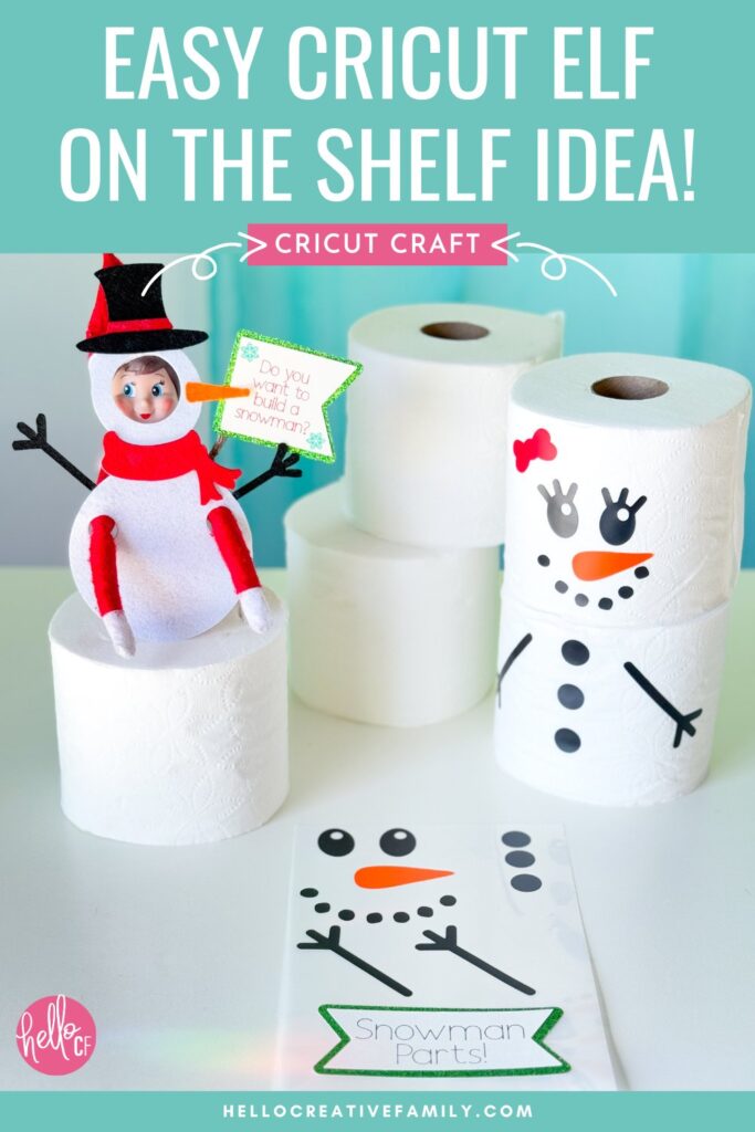 Elf on the Shelf dressed in a handmade felt snowman costume, standing next to toilet paper rolls transformed into snowmen with Cricut vinyl stickers.