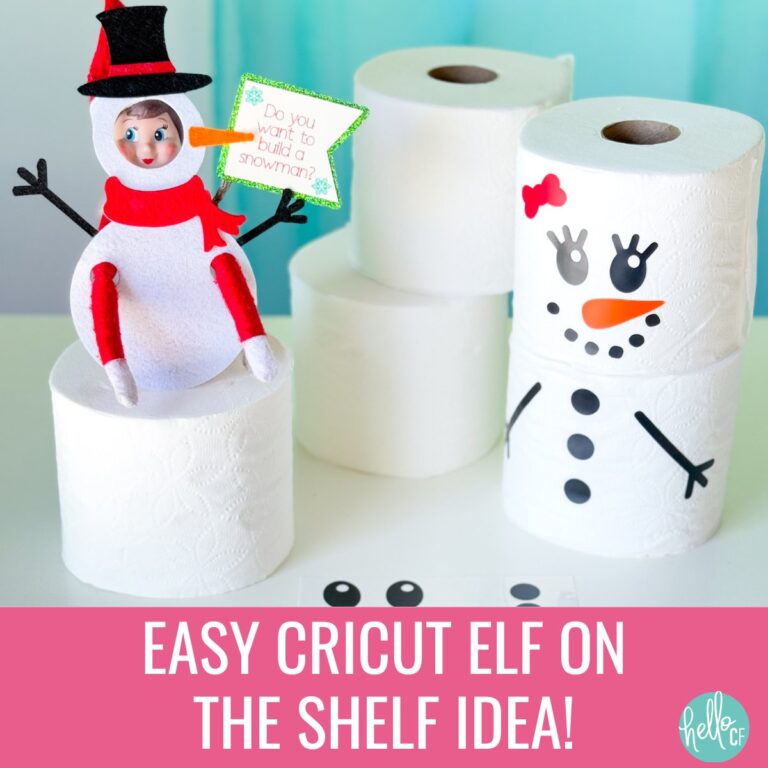 DIY Elf on the Shelf snowman scene featuring an elf in a snowman costume and snowmen made from toilet paper rolls with vinyl decals.