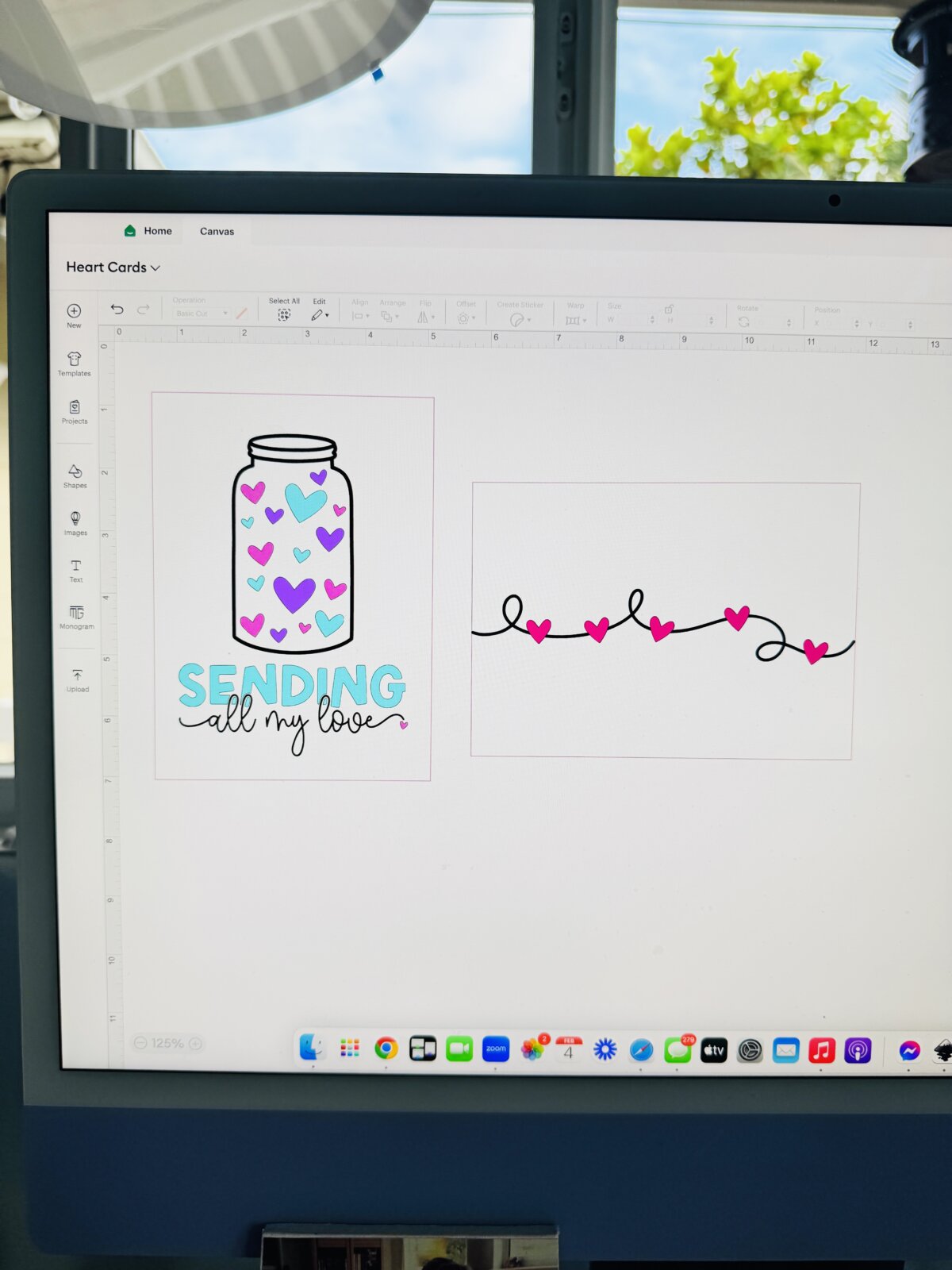 Cricut Design Space open on a computer with two heart cards laid out
