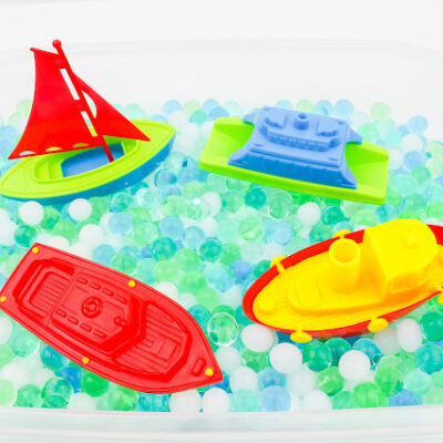 Busy Boats Sensory Bin with Water Beads by Attachment Mummy