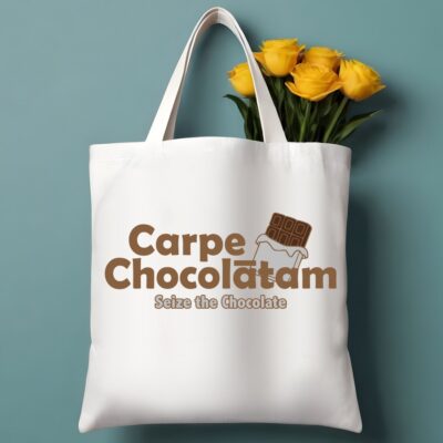 White tote bag mockup featuring the phrase “Carpe Chocolatam” with the subtitle “Seize the Chocolate” and a chocolate bar graphic.